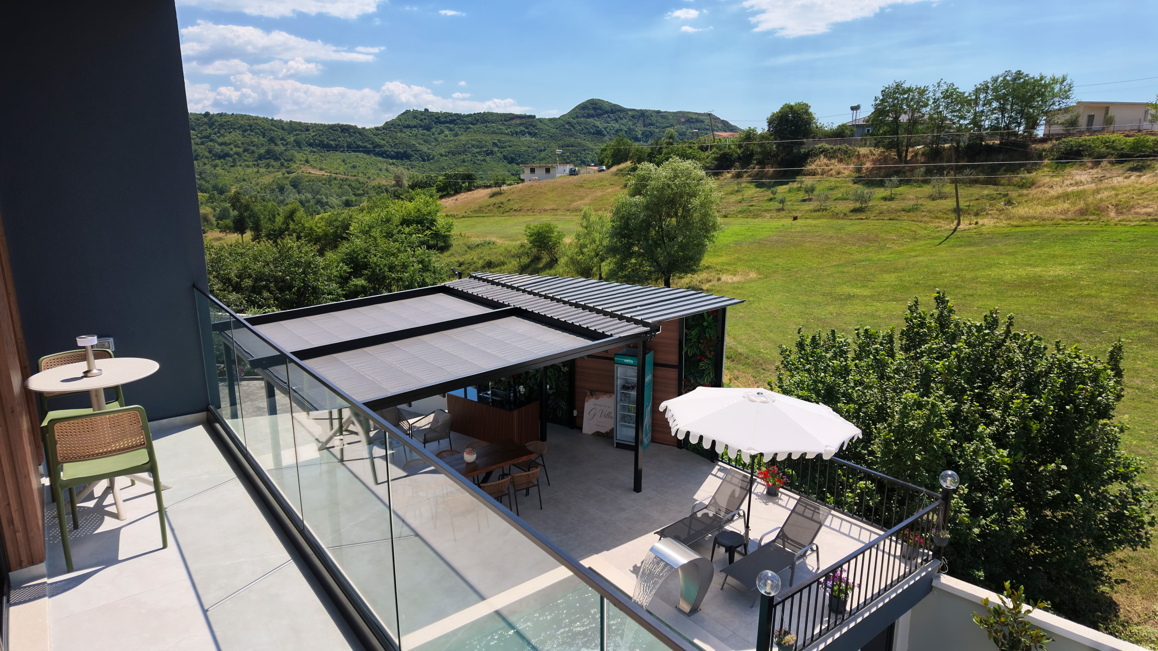 The upper terrace, looking down over the pool